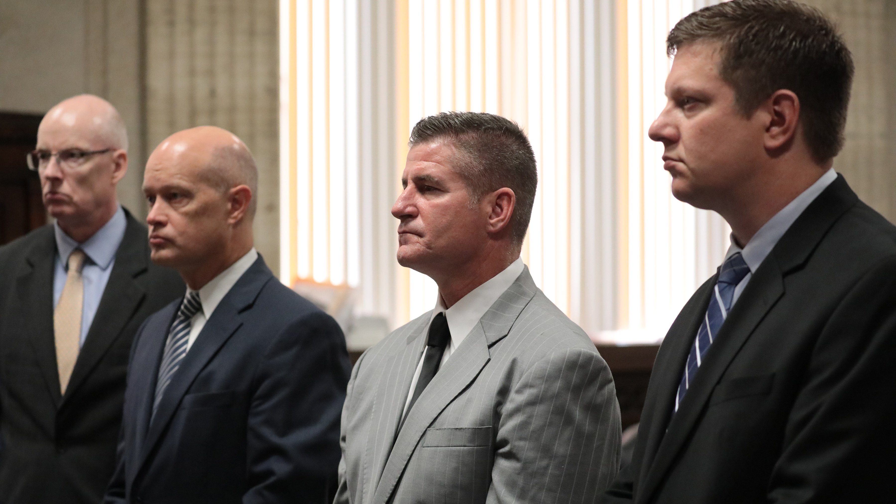 From left: Attorney Joseph Cullen, special prosecutor Joe McMahon, attorney Daniel Herbert and his client Chicago police Officer Jason Van Dyke at the trial for the shooting of Laquan McDonald at the Leighton Criminal Court Building, Friday, Sept. 14, 2018. (Antonio Perez /Pool/ Chicago Tribune)