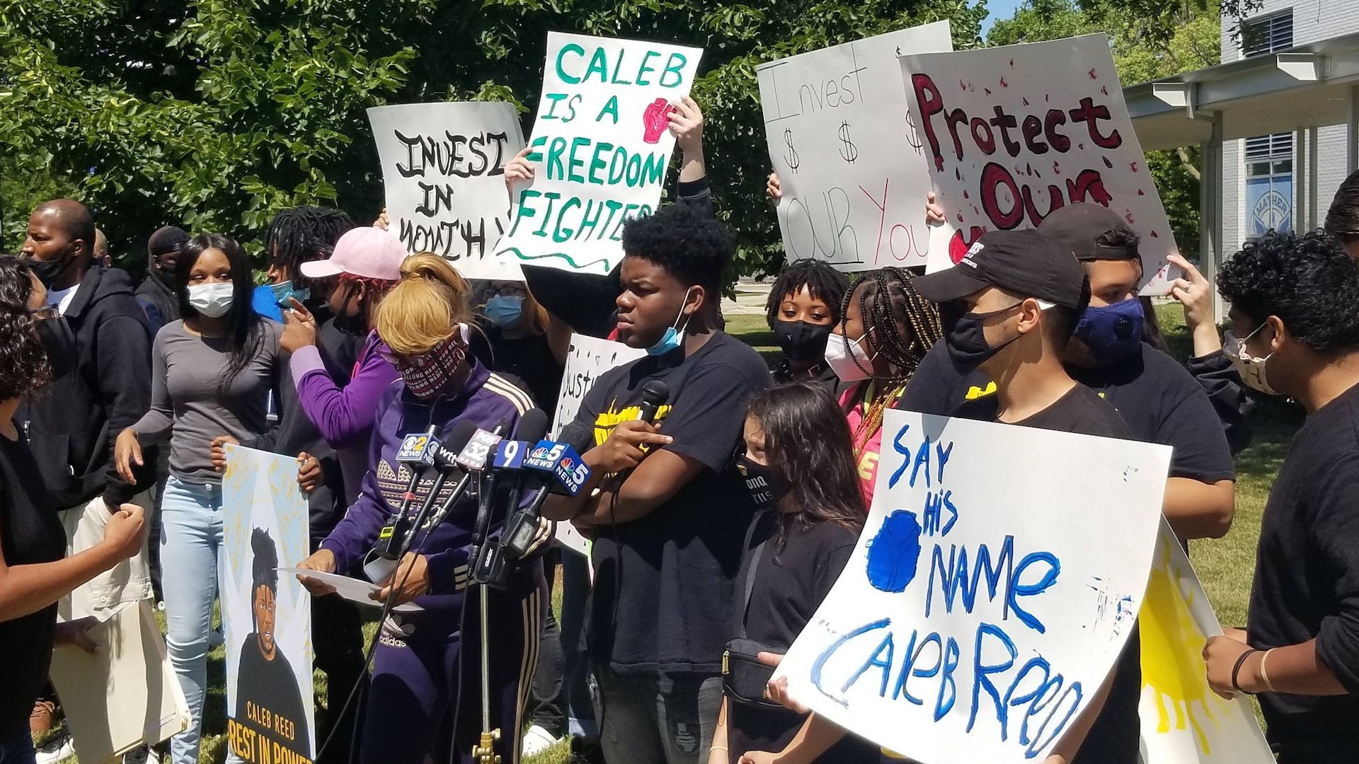 Family and friends of teen activist Caleb Reed gather outside Mather High School Tuesday, Aug. 4, 2020. Reed, 17, died Sunday after he was shot days earlier. (Matt Masterson / WTTW News)