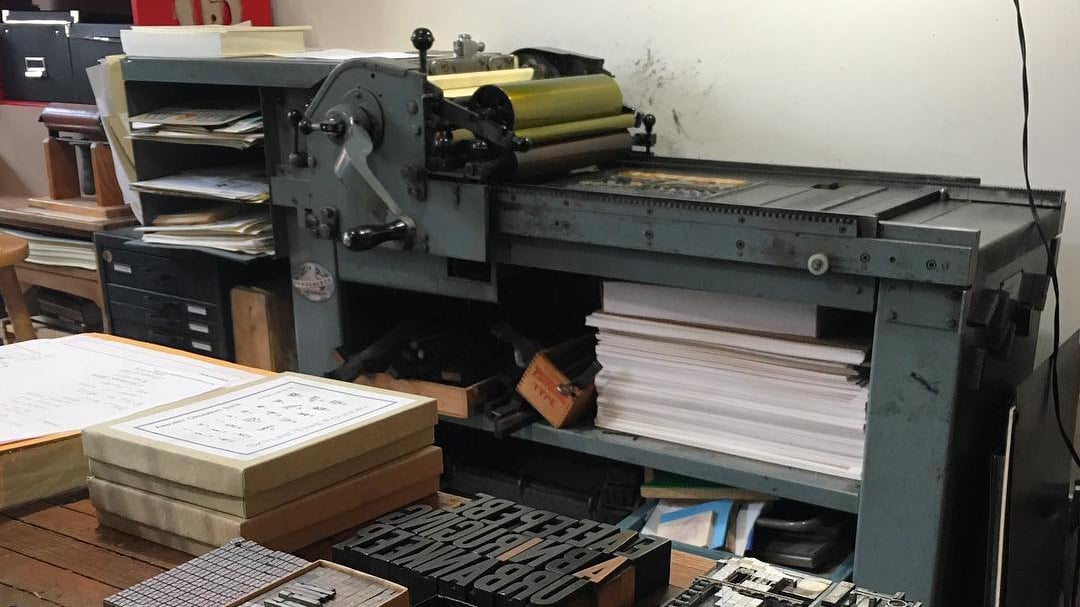 Printing, old-school style. Vandercook presses, like the one in the background, were manufactured in Chicago from the early 1900s through the '60s. Steinbach does her printing out of the Ravenswood studio of Starshaped Press, run by Jennifer Farrell. (Current Location Press / Facebook)
