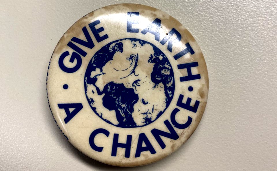 Karen Furnweger bought this pin for a buck at the first Earth Day and wears it every year. "It's the best dollar I ever spent," she said. (Courtesy Karen Furnweger)