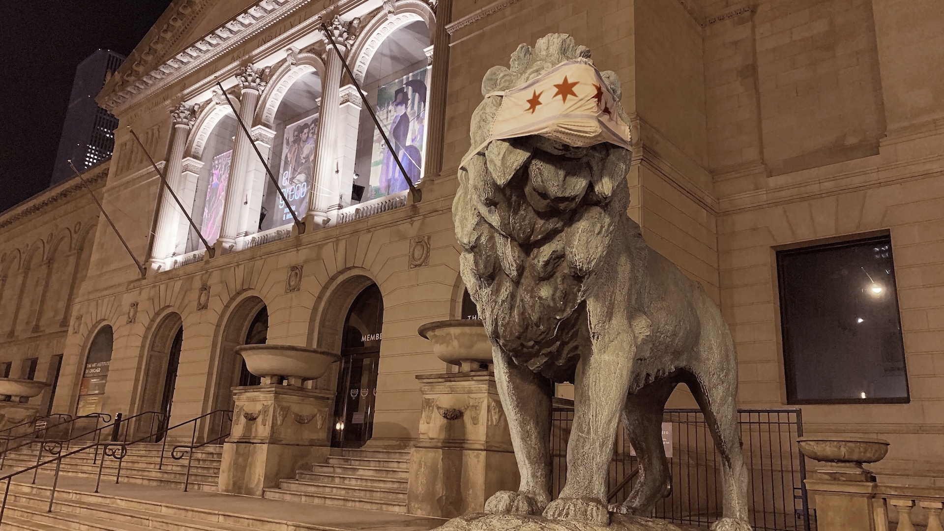 This Friday, May 1, 2020 photo shows a lion statue with a mask placed on it at the Art Institute of Chicago. (Sam Kelly / Chicago Sun-Times via AP)