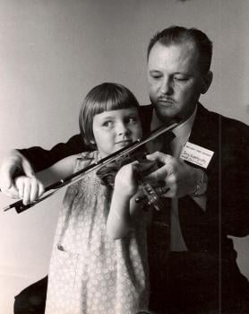 Melanie with her father at age 4; she learned to read music before she could read words; photo courtesy of Arthur Montzka