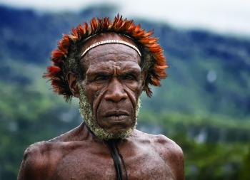 A Dani man, from the Baliem Valley of the New Guinea HIghlands. Credit: Carlo Ottaviano Casana