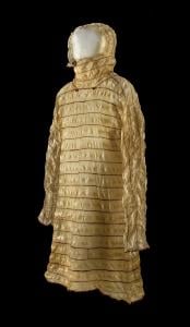 This Inuit raincoat is made of translucent seal intestines, meticulously stitched together with red and blue thread. Simply and elegantly decorated, this coat has a timeless quality. John Weinstein © The Field Museum