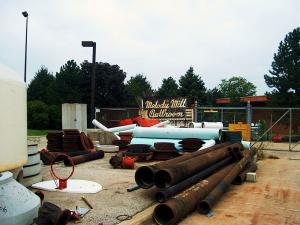 Melody Mill sign stored in public works yard, 2006