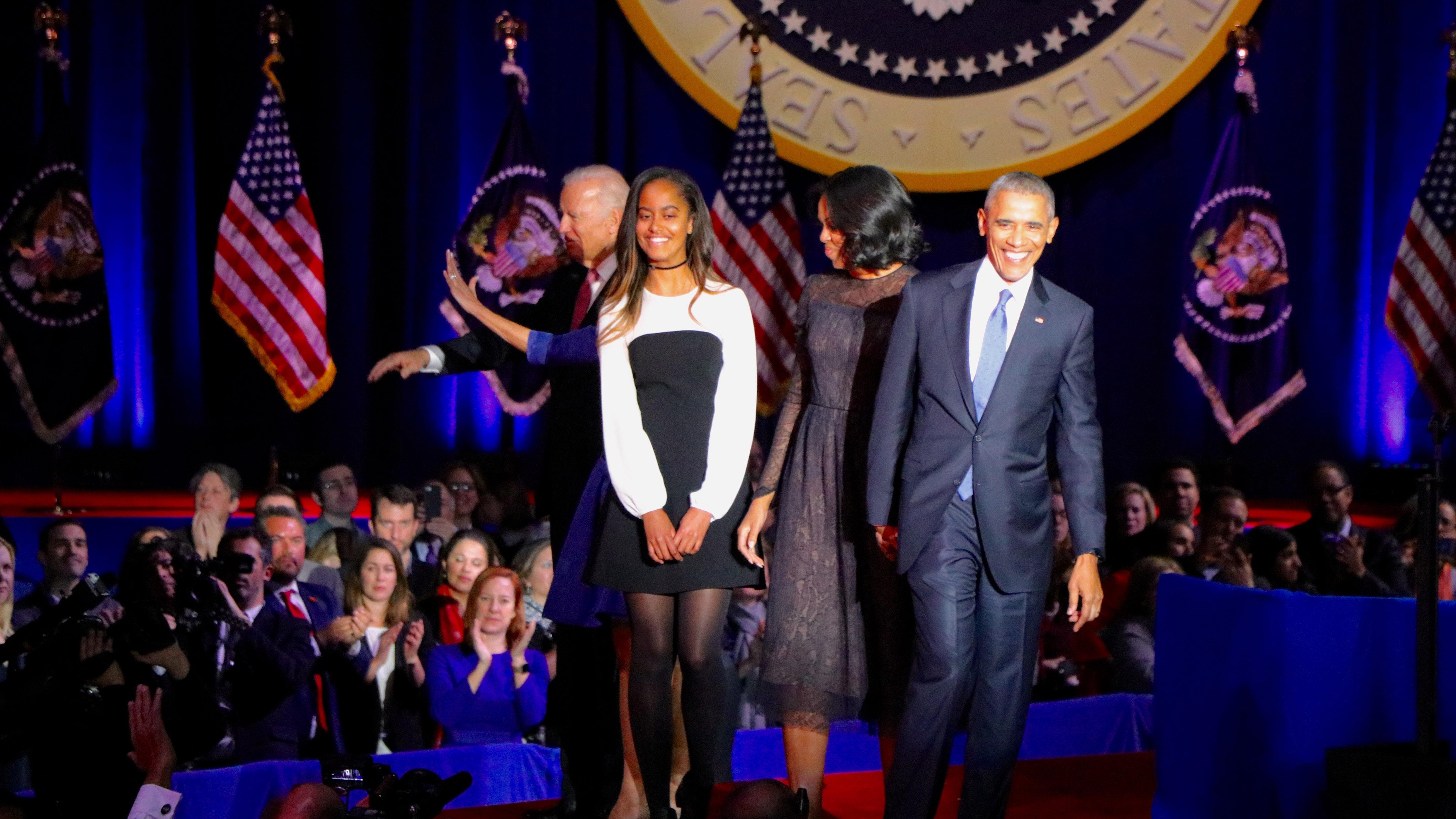 First Lady Michelle Obama, daughter Malia Obama, Vice President Joe Biden and Dr. Jill Biden join the president onstage after he finishes his speech. (Evan Garcia / Chicago Tonight)