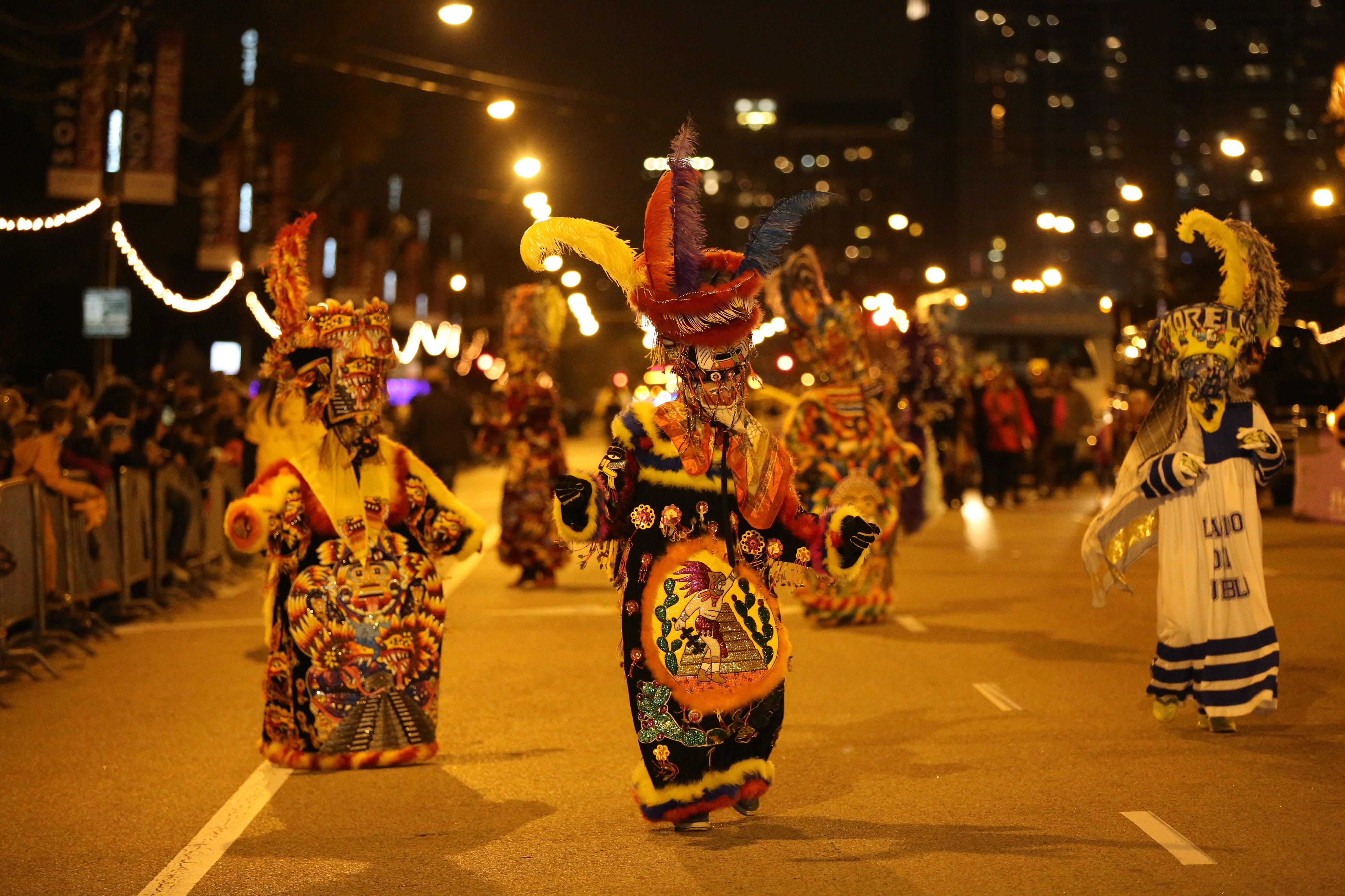 Spectacle after sundown: Don’t miss the Arts in the Dark parade Saturday.