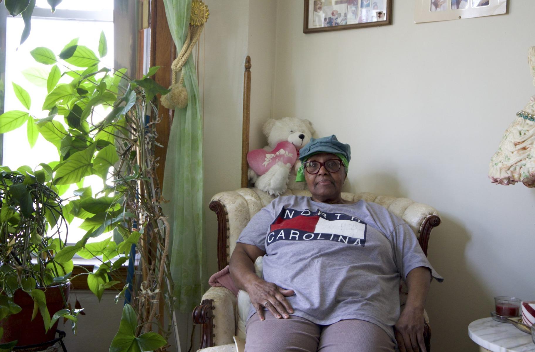 Queen Jackson, 83, has lived in her West Garfield Park home for six decades. She said she invested money into flood control efforts -- and she still faced significant flood damage from the storm last July. (Meredith Newman / Illinois Answers Project)