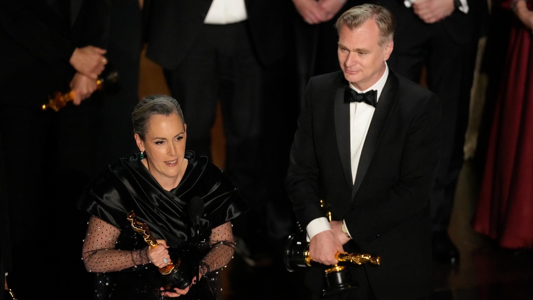 Emma Thomas, left, and Christopher Nolan accept the award for best picture for "Oppenheimer" during the Oscars on Sunday, March 10, 2024, at the Dolby Theatre in Los Angeles. (AP Photo / Chris Pizzello)