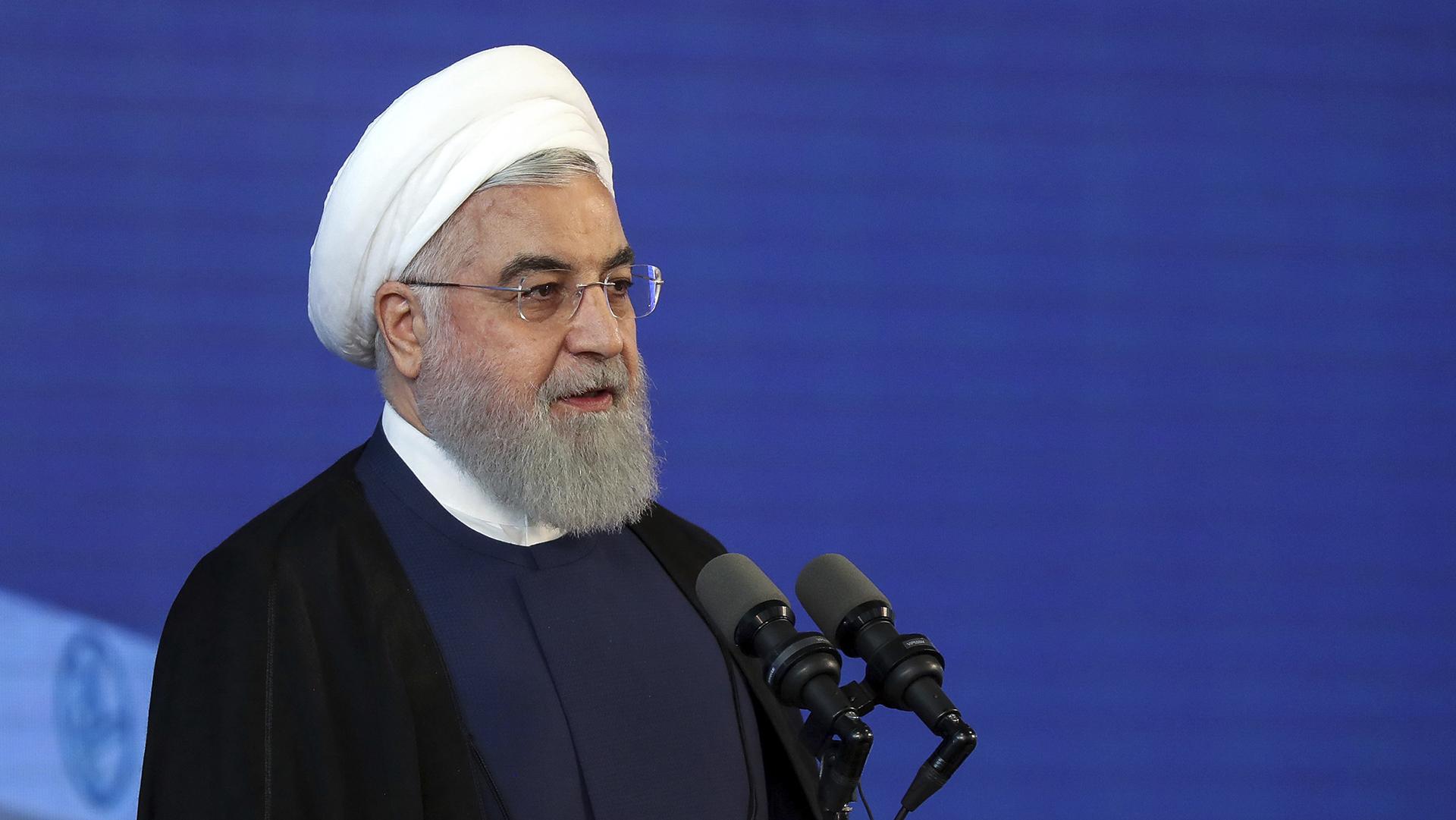 In this photo released by an official website of the office of the Iranian Presidency, Iranian President Hassan Rouhani speaks in a ceremony at Imam Khomeini International Airport some 25 miles south of the capital Tehran, Iran, Tuesday, June 18, 2019. (Iranian Presidency Office via AP)