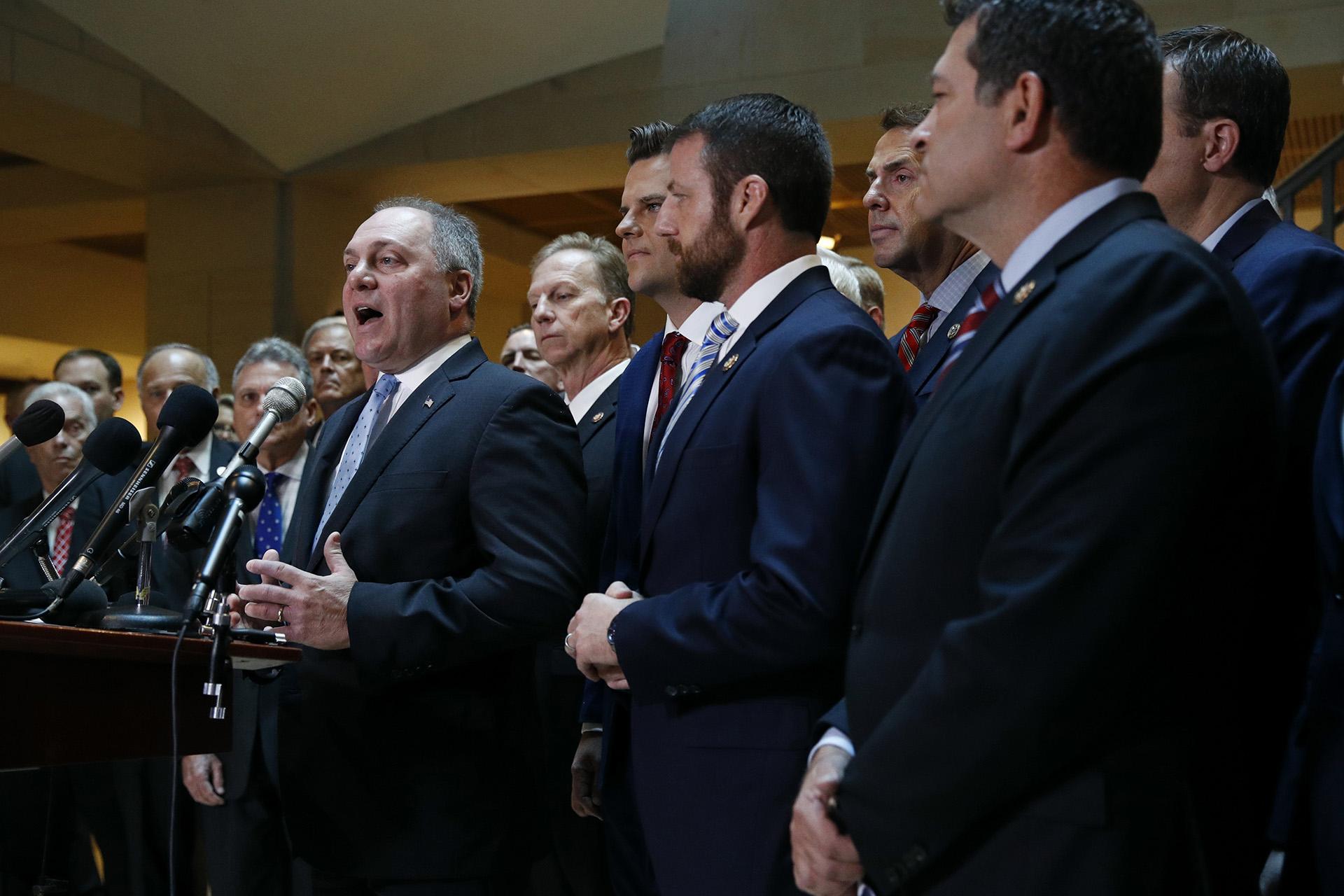 House Minority Whip Steve Scalise, R-La., left, speaks at a news conference in front of House Republicans after Deputy Assistant Secretary of Defense Laura Cooper arrived for a closed door meeting to testify as part of the House impeachment inquiry into President Donald Trump, Wednesday, Oct. 23, 2019, on Capitol Hill in Washington. (AP Photo / Patrick Semansky)
