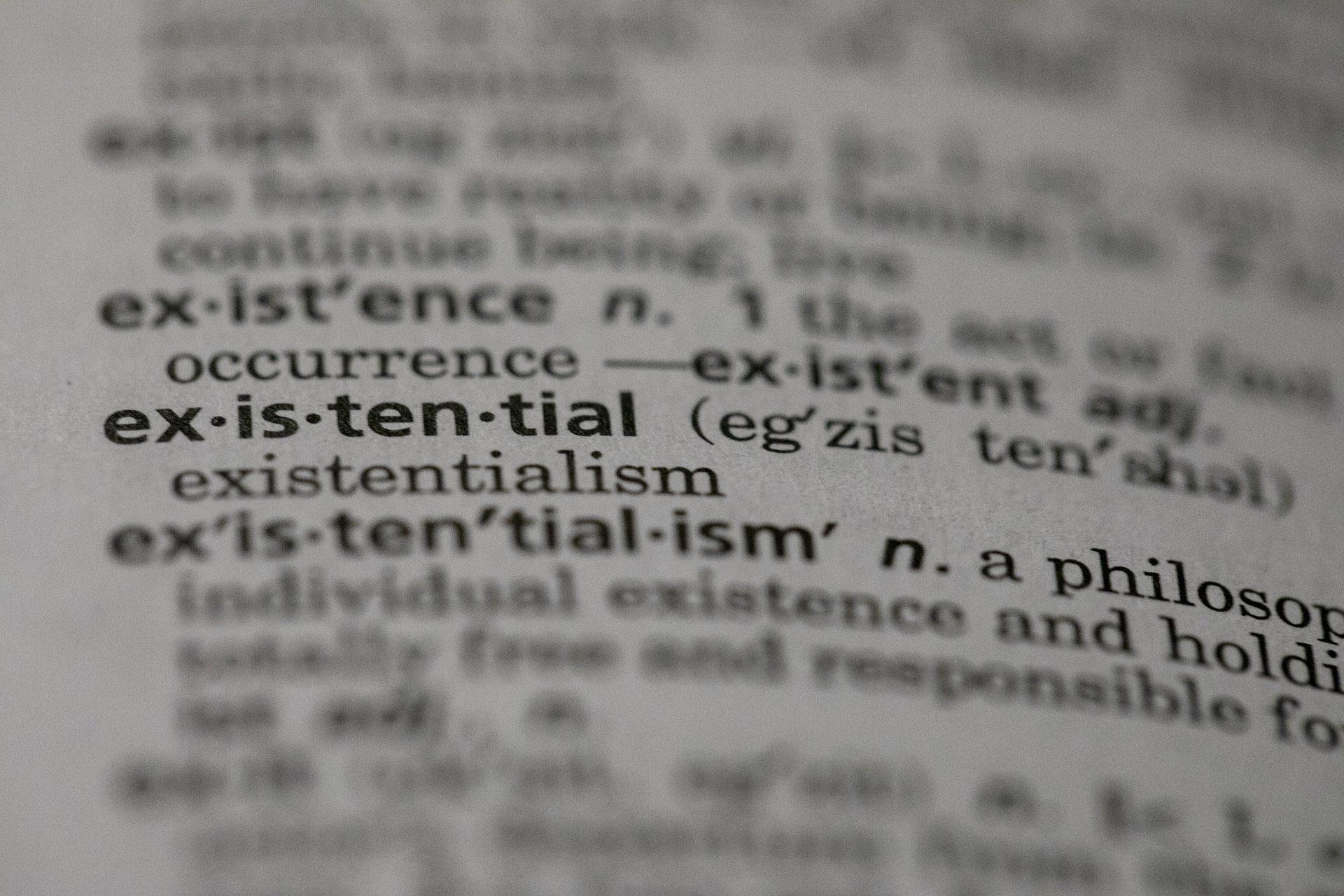 This Sunday, Dec. 1, 2019, photo shows the word “existential” in a dictionary in the Brooklyn borough of New York. Dictionary.com picked “existential” as the word of the year. (AP Photo / Jenny Kane)