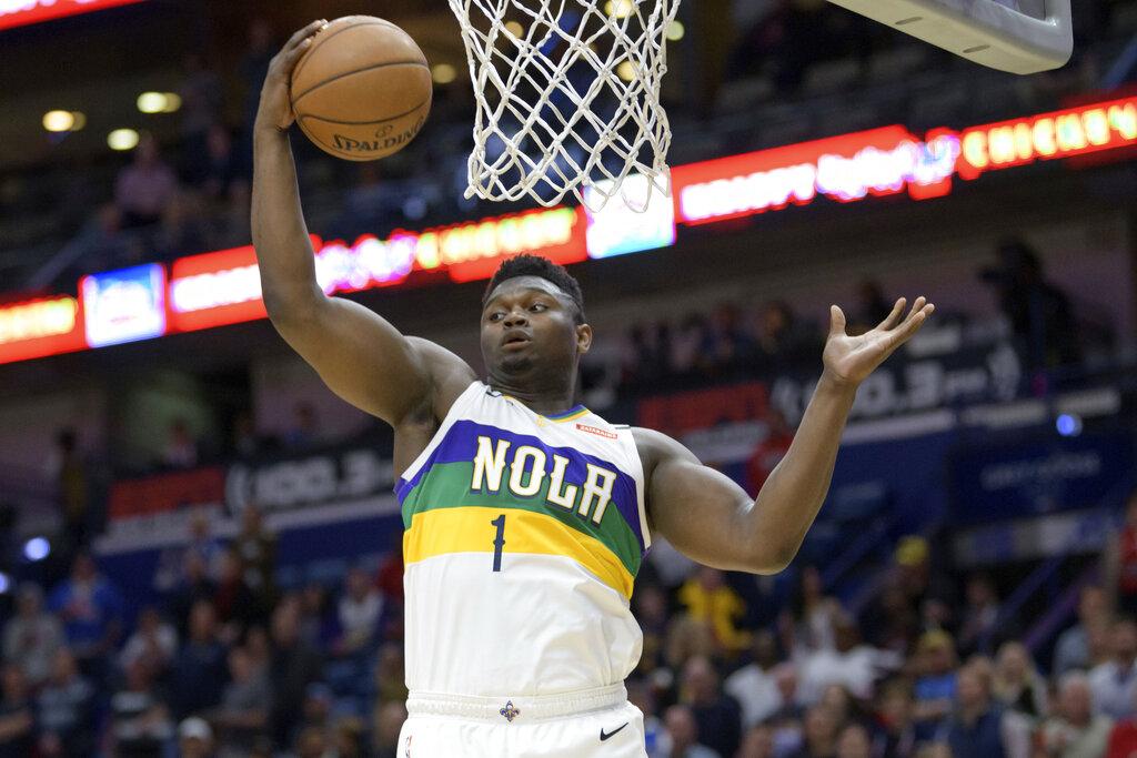 New Orleans Pelicans forward Zion Williamson grabs a rebound during the first half of the team’s NBA basketball game against the Oklahoma City Thunder in New Orleans, Thursday, Feb. 13, 2020. (AP Photo / Matthew Hinton)