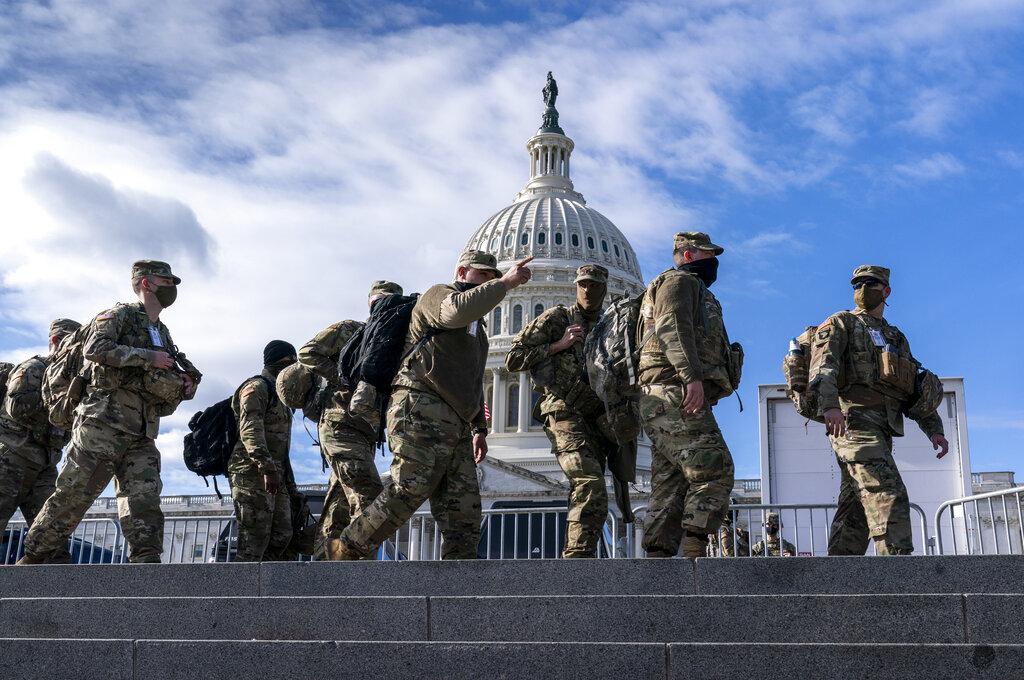 National Guard troops reinforce security around the U.S. Capitol ahead of the inauguration of President-elect Joe Biden and Vice President-elect Kamala Harris, Sunday, Jan. 17, 2021, in Washington. (AP Photo / J. Scott Applewhite)