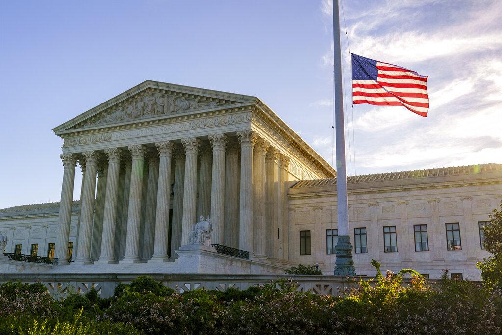 The flag flies at half-staff at the Supreme Court on the morning after the death of Justice Ruth Bader Ginsburg, 87, Saturday, Sept. 19, 2020 in Washington. (AP Photo / J. Scott Applewhite)
