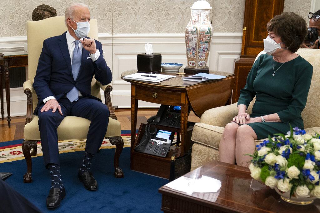 President Joe Biden meets with Sen. Susan Collins, R-Maine, to discuss a coronavirus relief package, in the Oval Office of the White House, Monday, Feb. 1, 2021, in Washington. (AP Photo / Evan Vucci)