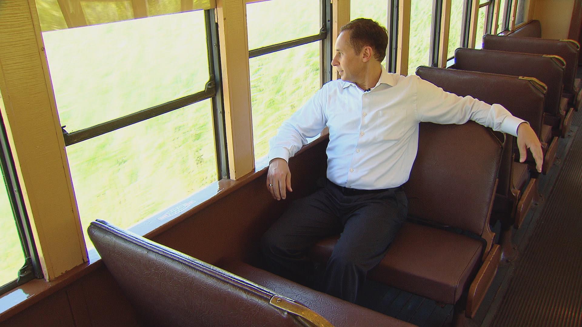 Eddie Arruza enjoys “dynamic air conditioning” on a vintage railcar.