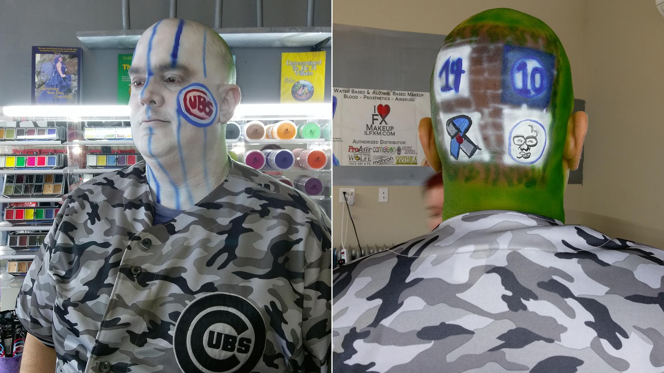 Russell Duffer shows off a Cubs-themed pinstripes-and-ivy paint job courtesy of makeup artist Colleen Jones. (Erica Gunderson / Chicago Tonight)