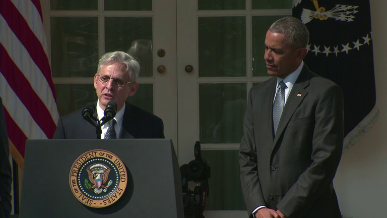 Merrick Garland speaks on March 16 at the White House Rose Garden as President Barack Obama watches on.