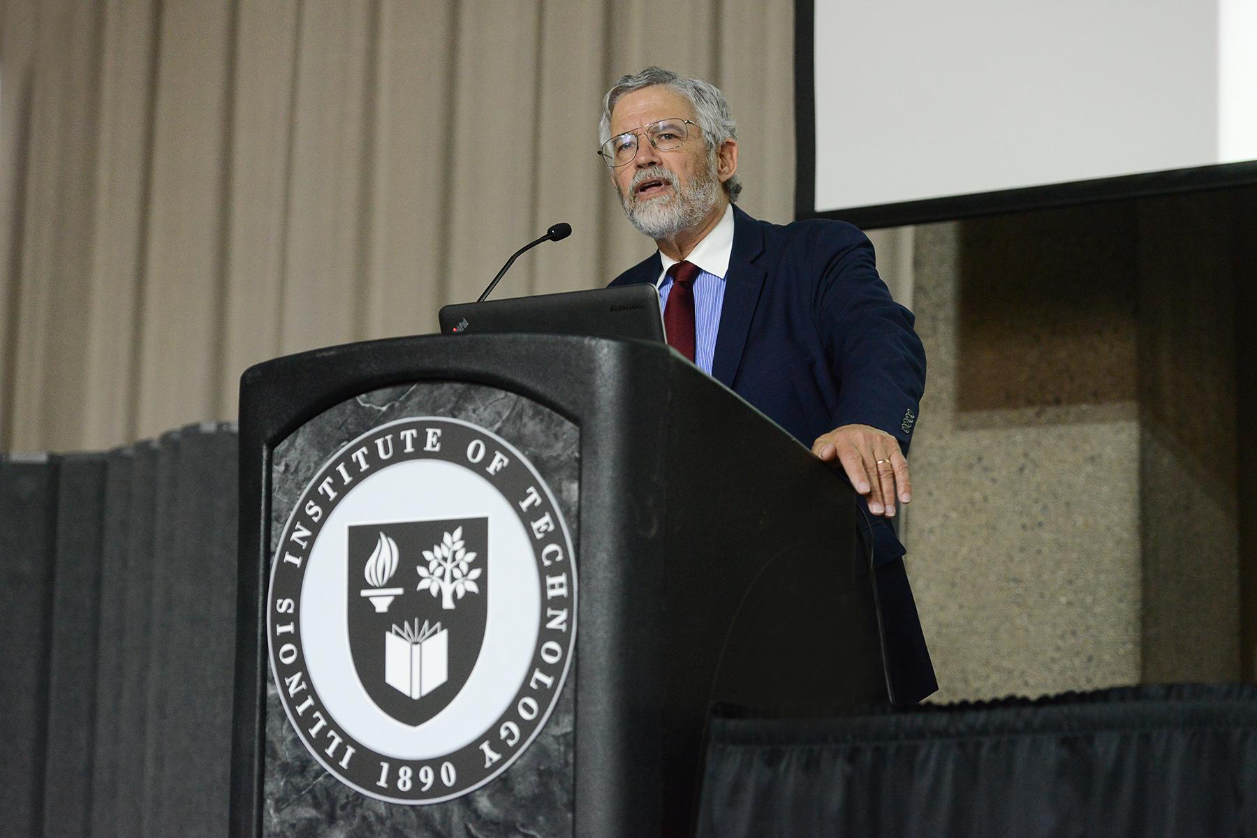 John P. Holdren, President Barack Obama’s science and technology adviser from 2009-2017, gives a lecture on climate change Oct. 19 at the Illinois Institute of Technology. (Bonnie Robinson / Illinois Institute of Technology)