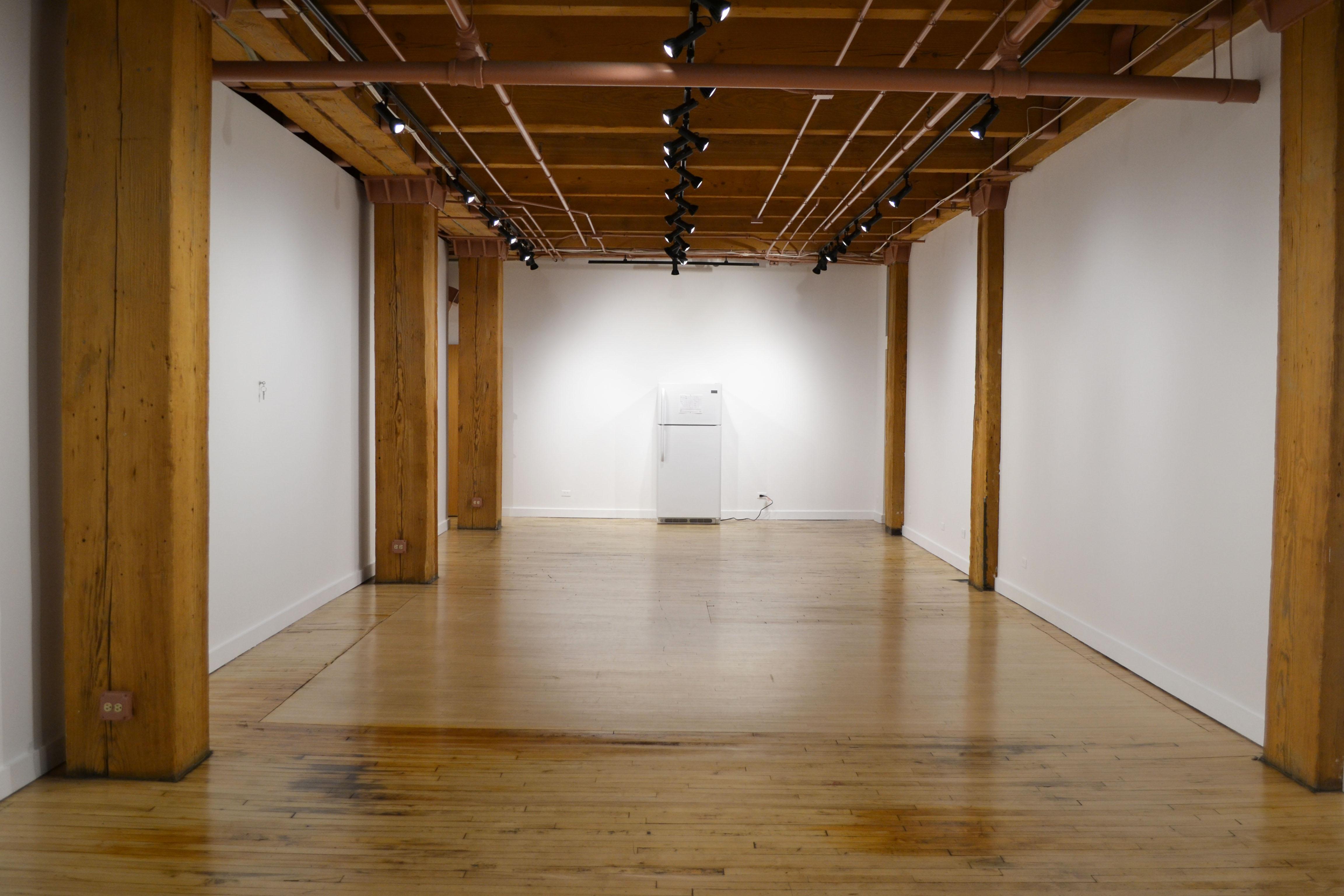The minimalist exhibition at the Weinberg/Newton Gallery raises questions about representation in art and invites visitors to engage in the conversation surrounding homelessness. (Maya Miller / Chicago Tonight.)