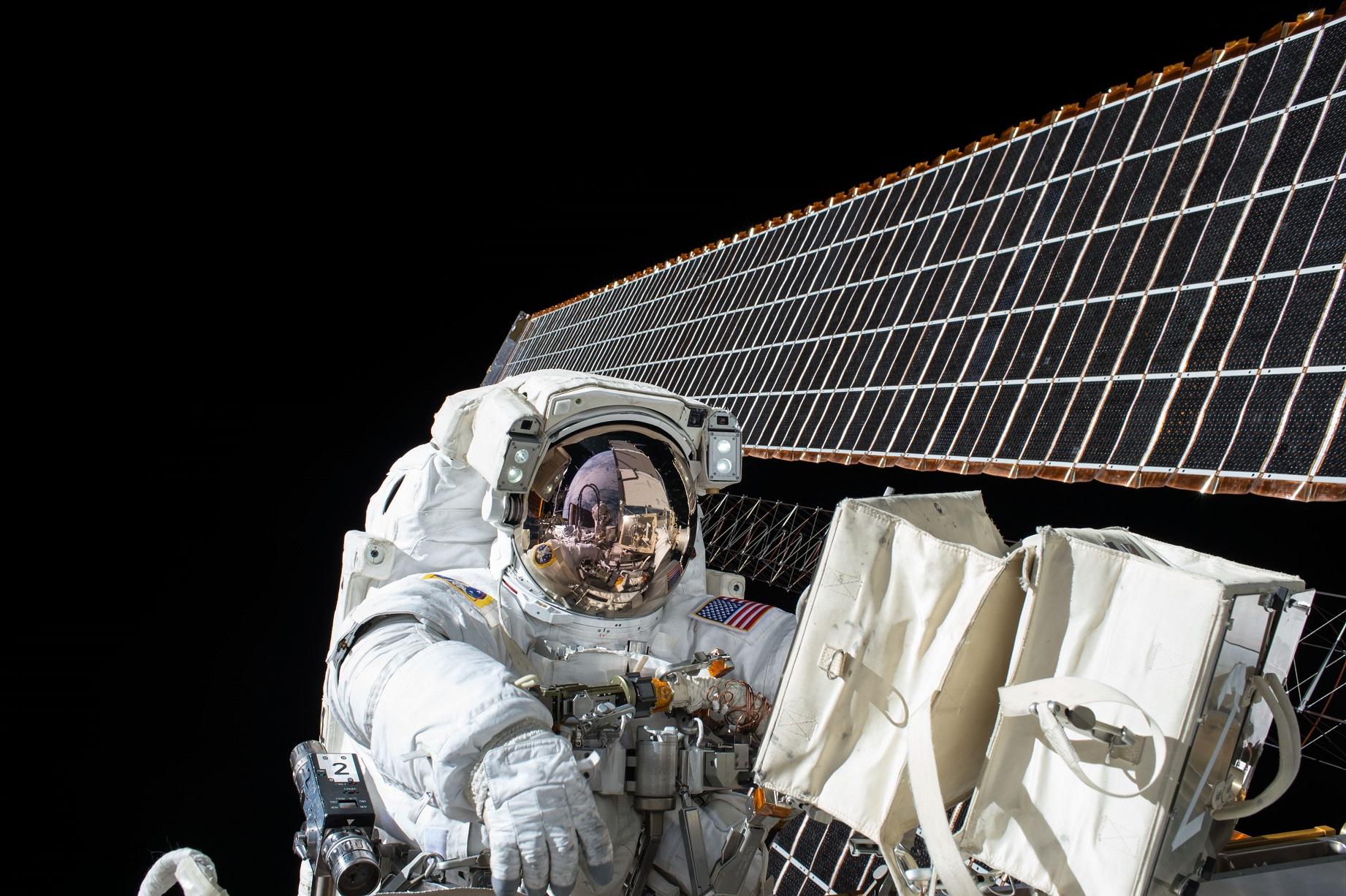 Astronaut Scott Kelly conducts maintenance work on the International Space Station. (Courtesy NASA) 