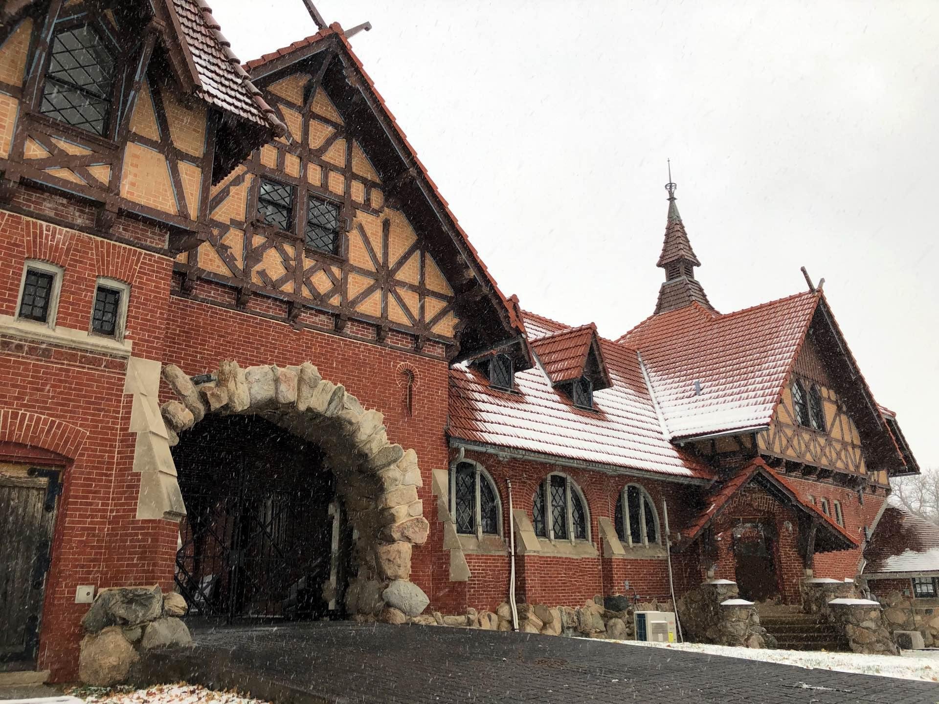During a typical review process, the proposed archive facility would be expected to mimic or incorporate details of the landmarked Receptory Building and Stable, such as the stone, brick, tile and rooflines. (Patty Wetli / WTTW News)