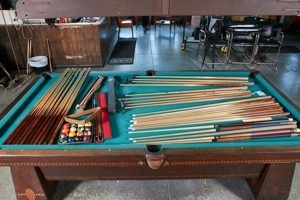 When Oak Park billiards suddenly shuttered 10 years ago, all of the equipment was left inside. Many of the regulars who had left their cues there had to call the owners to retrieve them. (Courtesy of Karen Mcmillin)