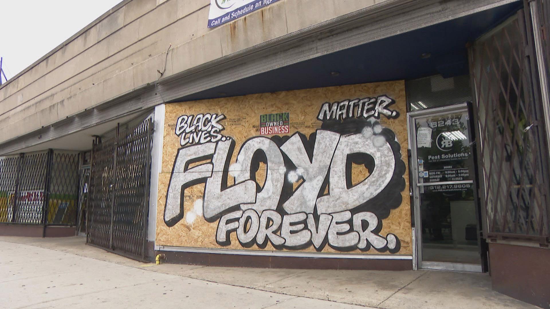 A mural in Chicago featured in the new book “Boarded Up Chicago: Storefront Images Days After the George Floyd Riots.” (WTTW News)