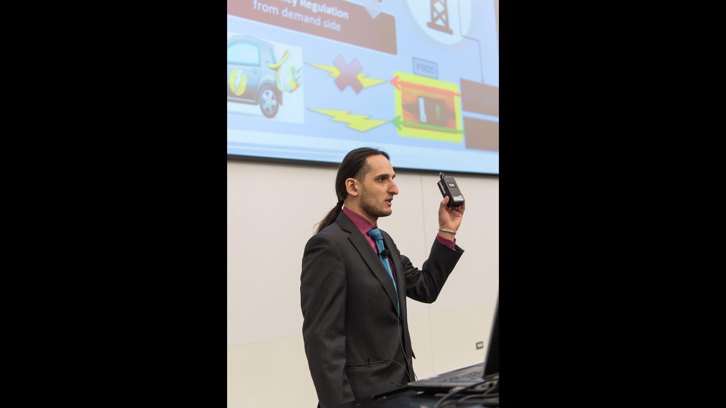 Diego Fazi from Argonne National Laboratory discusses technology at a laboratory pitch competition. He will moderate a pitch competition for innovations arising from work at Argonne on Sept. 14. (Courtesy Argonne National Laboratory)