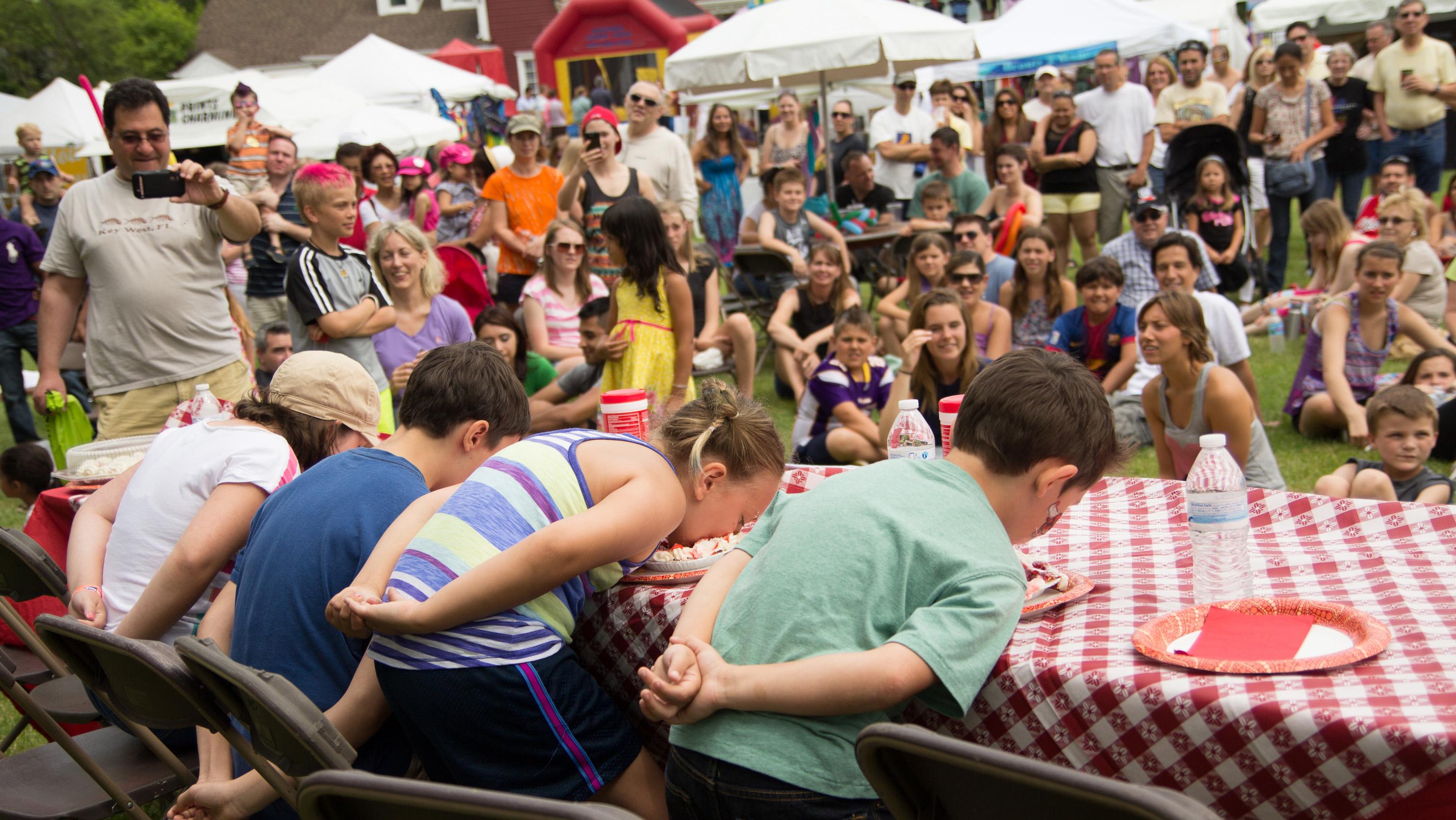 A strawberry pie-eating festival takes place at Strawberry Fest. (Courtesy of Jody Grimaldi)