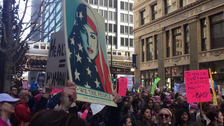 Chants of “this is what democracy looks like” echoed through downtown streets Jan. 21 as an estimated 250,000 individuals joined the Women’s March on Chicago. (Maya Miller / Chicago Tonight)