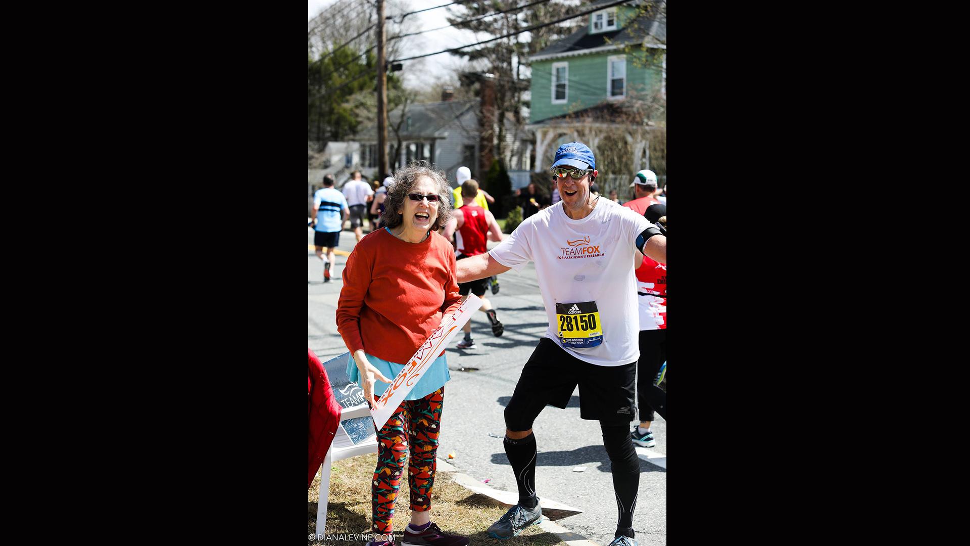 Bill Bucklew, right, poses for a picture with a supporter during the Boston Marathon on April 15, 2019. (Courtesy of Bill Bucklew)