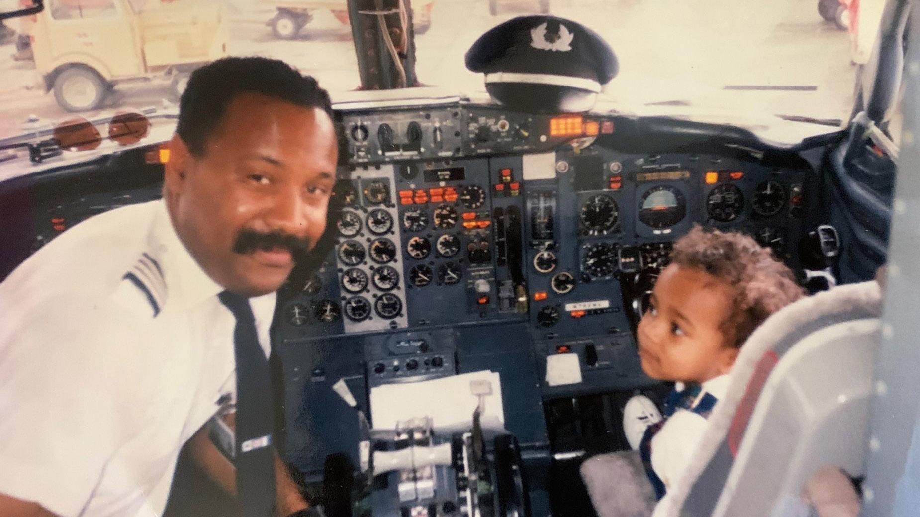 Captain Ruben Flowers and his son, also called Ruben Flowers, posed for this photograph in the airplane flight deck in 1994. They recently recreated the photo, with a twist. (Courtesy of Southwest Airlines)