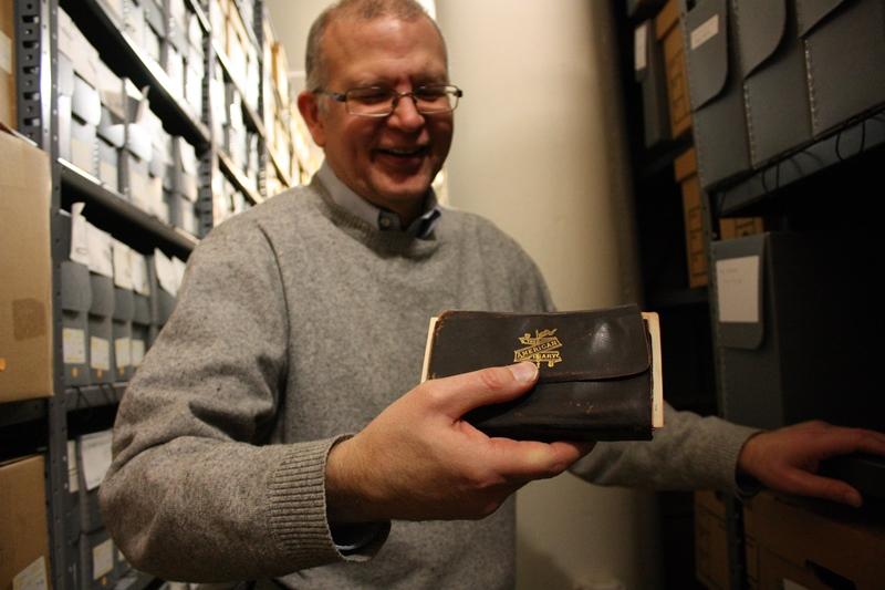 Chicago History Museum archivist Peter Alter holding Elmer Whiting's diary from 1894. (Chloe Riley)
