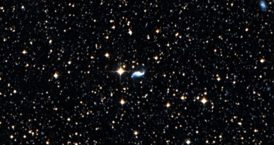 Scientists have detected the first X-rays from what appears to be a type Ia supernova, located inside a spiral-shaped galaxy about 260 million light-years from Earth. (Courtesy Digital Sky Survey)