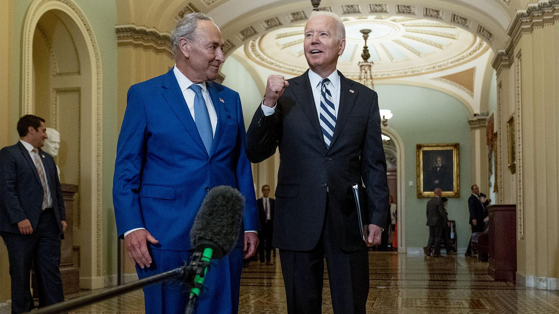 President Joe Biden joins Senate Majority Leader Chuck Schumer, D-N.Y., and fellow Democrats at the Capitol in Washington, Wednesday, July 14, 2021, to discuss the latest progress on his infrastructure agenda. (AP Photo / Andrew Harnik)