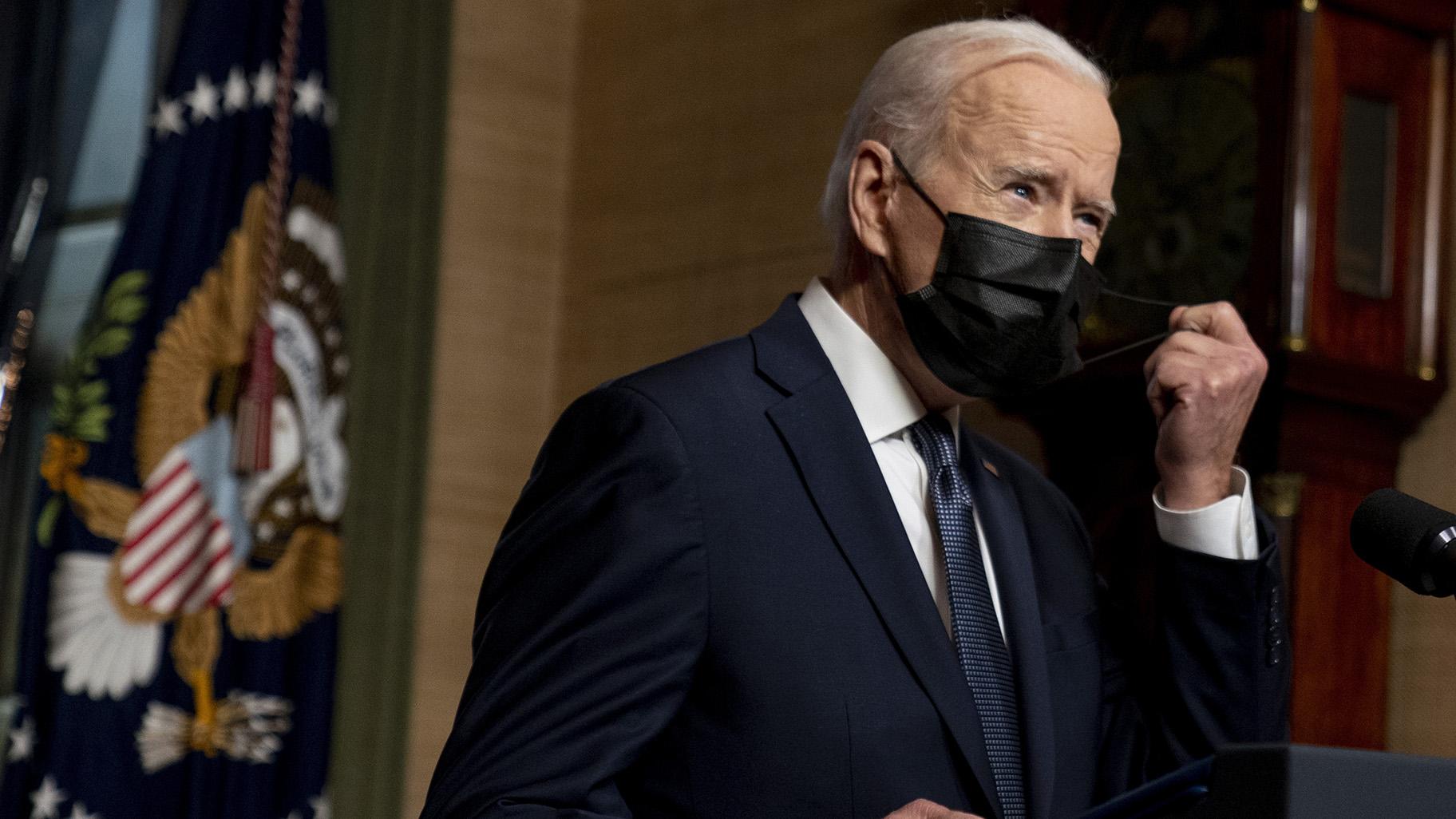 In this Wednesday, April 14, 2021, file photo, President Joe Biden removes his mask to speak at a news conference at the White House, in Washington. (AP Photo / Andrew Harnik, Pool, File)