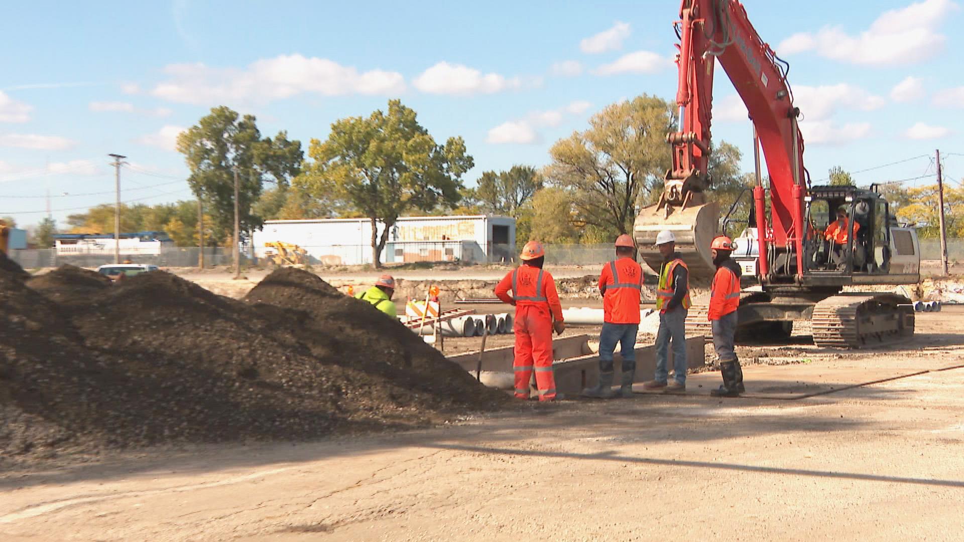Work is underway at a base camp for migrants in Brighton Park on Nov. 28, 2023. (WTTW News)