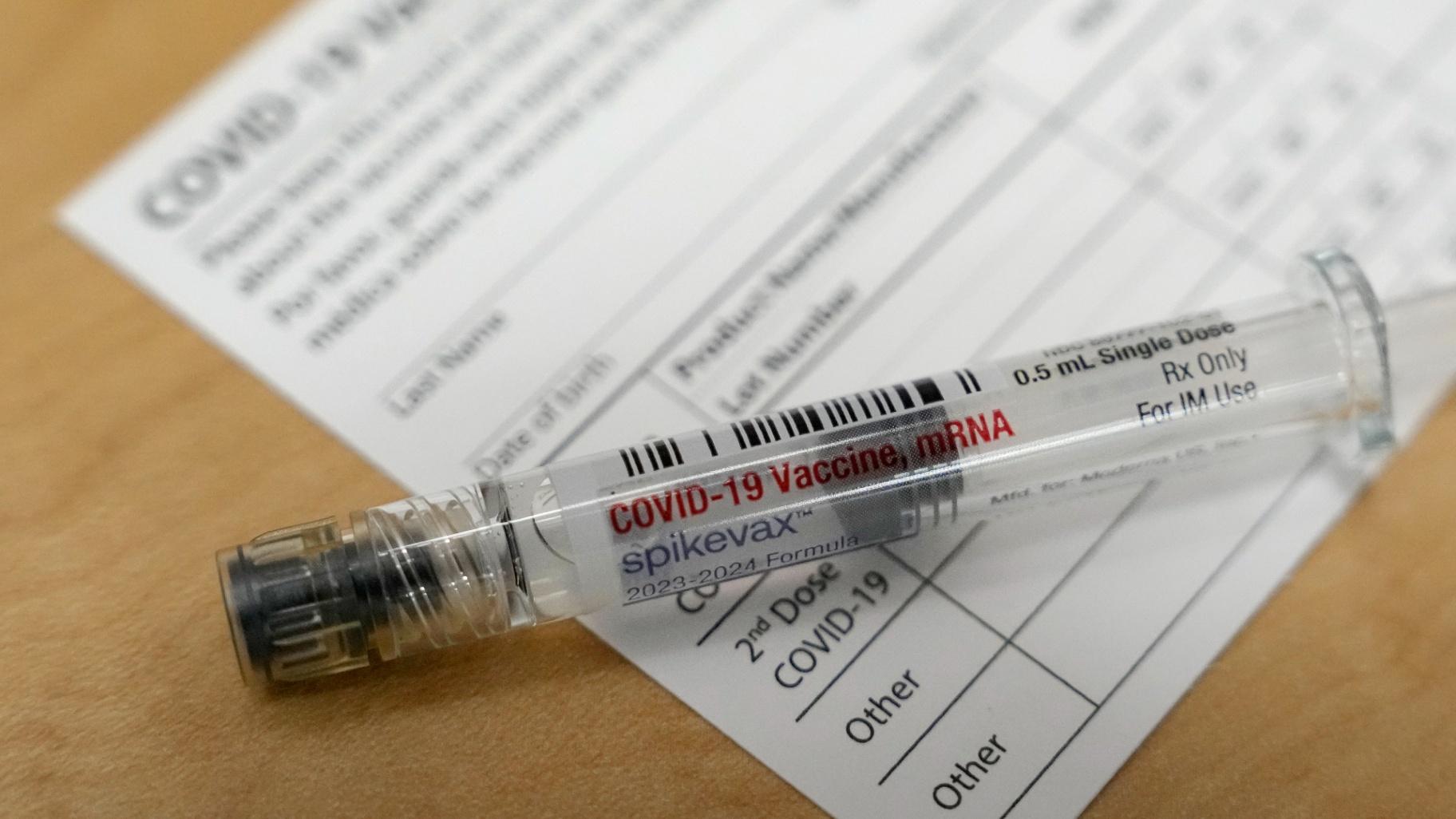 FILE - A Moderna Spikevax COVID-19 vaccine is seen at a drugstore in Cypress, Texas, Sept. 20, 2023. More than a month after federal officials recommended a new version of the COVID-19 vaccines, 7% of U.S. adults and 2% of children have gotten a shot. (Melissa Phillip / Houston Chronicle via AP, File)