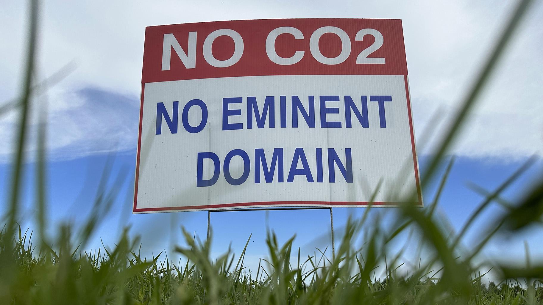 A sign reading “No CO2, no eminent domain” stands along a rural road east of Bismarck, N.D., on Aug. 15, 2023. (AP Photo / Jack Dura, file)