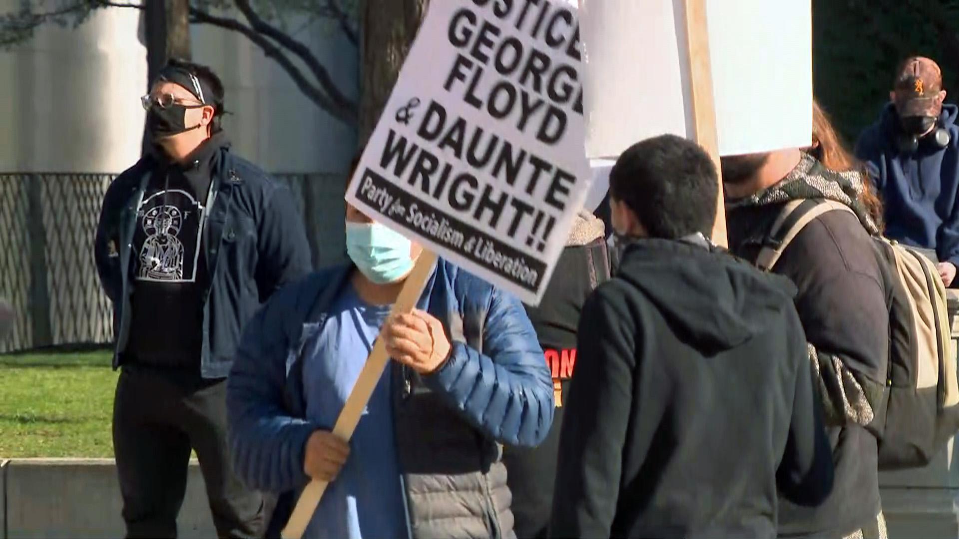 A group of approximately 100 protesters gathered near the Cloud Gate sculpture in Millennium Park to protest police brutality on April 13, 2021. (WTTW News)