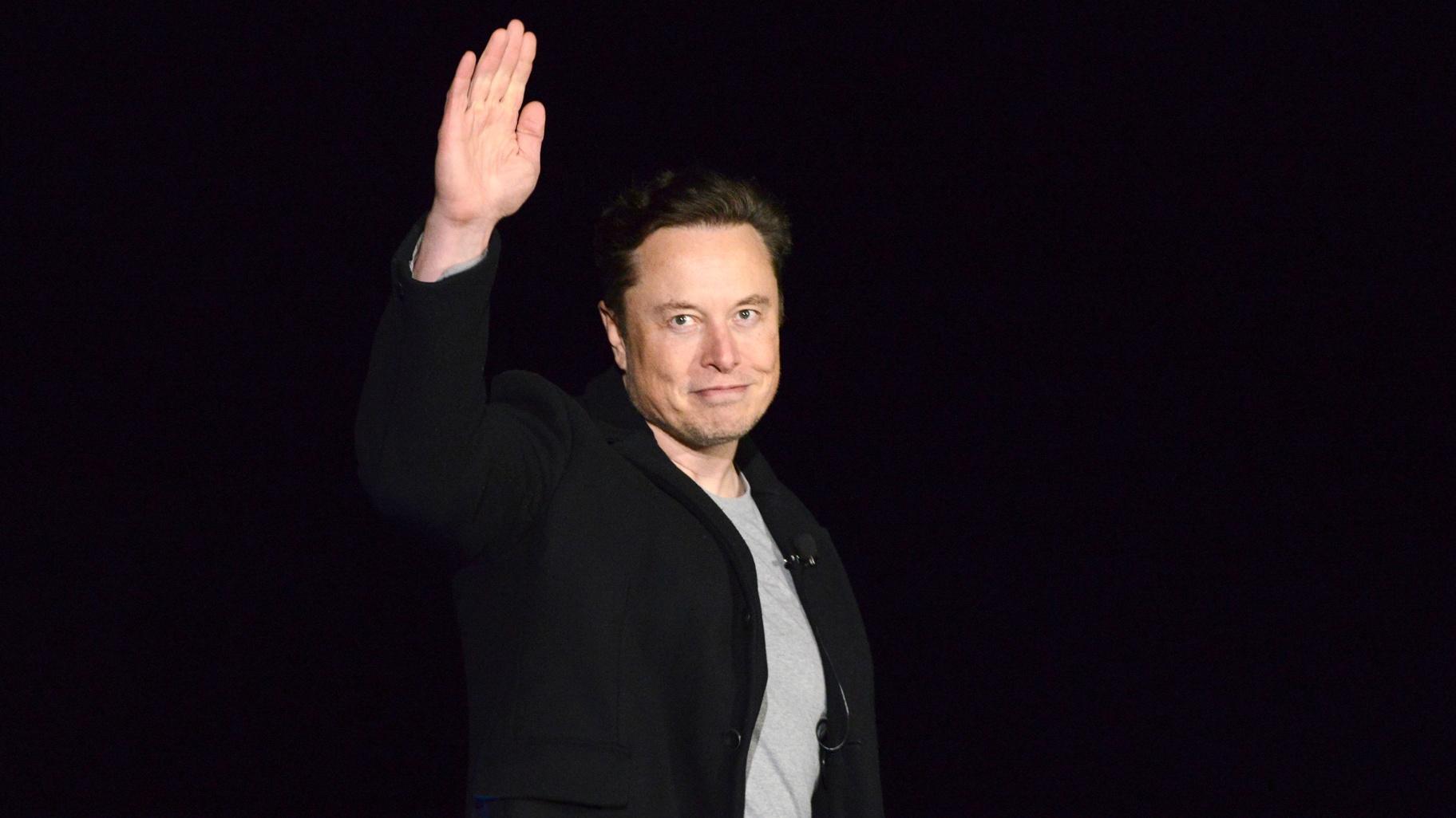SpaceX’s Elon Musk waves while providing an update on Starship, on Feb. 10, 2022, near Brownsville, Texas. (Miguel Roberts / The Brownsville Herald via AP, File)