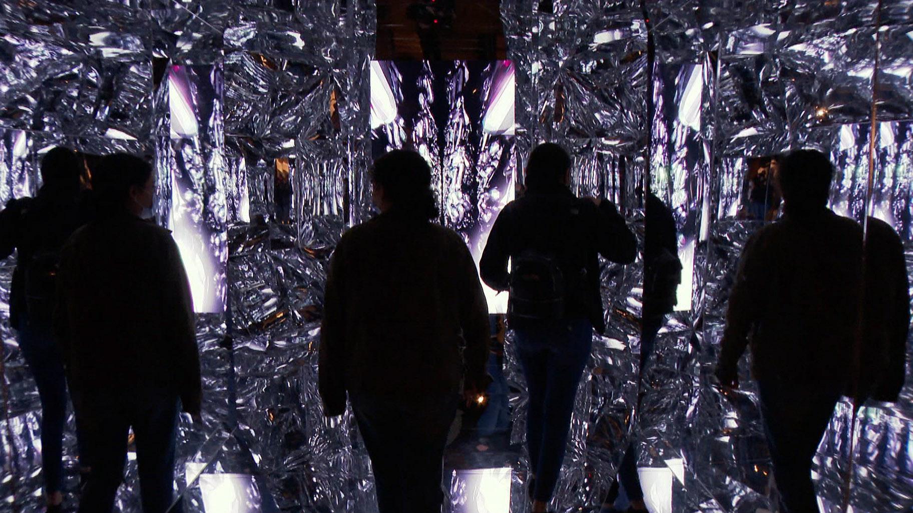 Because this room of mirrors allows this NFT to fully encompass a physical space, that makes “Quantum Mirror” the very first NFT sculpture. (WTTW News)