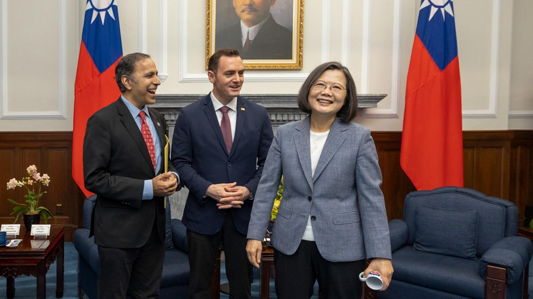 In this photo released by the Taiwan Presidential Office, Taiwan's President Tsai Ing-wen, right, meets with Rep. Mike Gallagher, the Republican chair of the House Select Committee on the Chinese Communist Party, center, and Raja Krishnamoorthi, D.-Ill., in Taipei, Taiwan, Thursday, Feb. 22, 2024. (Taiwan Presidential Office via AP)