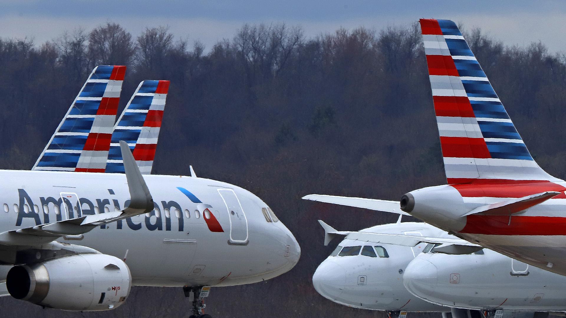 In this March 31, 2020 file photo American Airlines planes are parked at Pittsburgh International Airport in Imperial, Pa. (AP Photo / Gene J. Puskar, file)