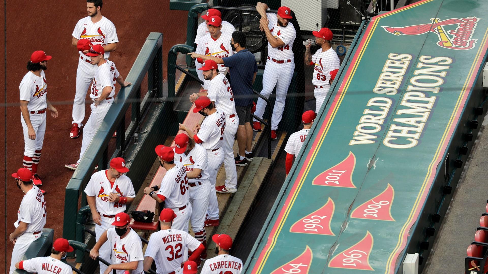 In this July 24, 2020, file photo, members of the St. Louis Cardinals wait to be introduced before the start of a baseball game against the Pittsburgh Pirates in St. Louis. (AP Photo / Jeff Roberson, File)