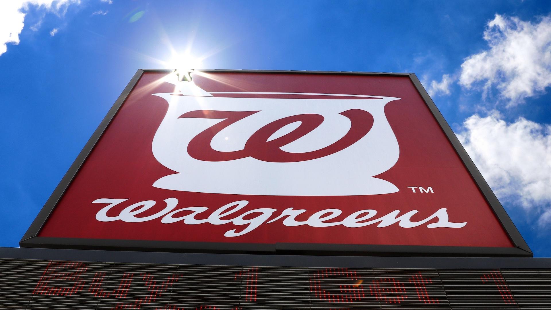 This June 25, 2019, file photo shows the sign outside a Walgreens Pharmacy in Pittsburgh. Walgreens Boots Alliance will sell its pharmaceutical wholesaler business to AmerisourceBergen in $6.5 billion cash and stock deal. (AP Photo/Gene J. Puskar, File)