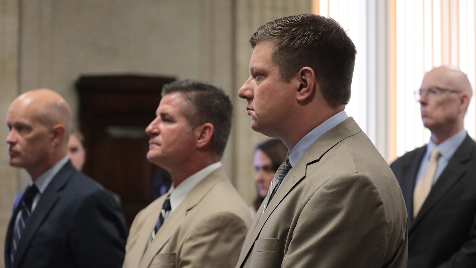 From left: Special prosecutor Joe McMahon, attorney Daniel Herbert and his client, Chicago police Officer Jason Van Dyke, attend a hearing on Sept. 4, 2018 concerning the shooting death of Laquan McDonald. (Antonio Perez / Pool / Chicago Tribune)