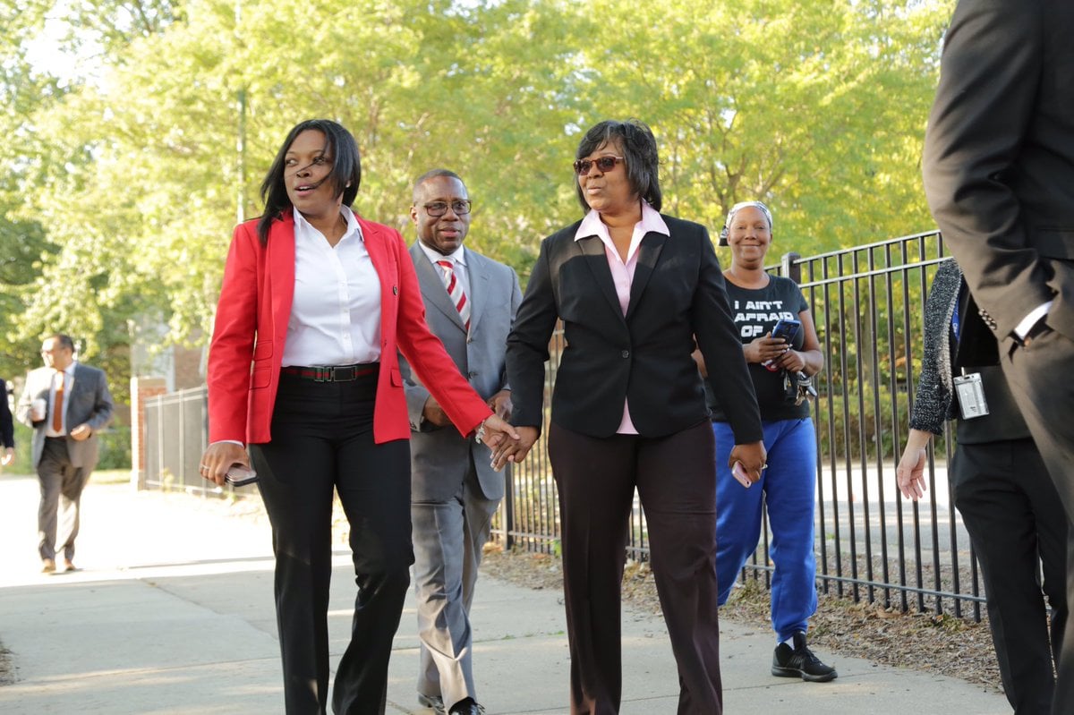 Jackson walks with Ald. Michelle Harris along a CPS Safe Passage route at Harold Washington Elementary last fall. (Janice Jackson / Twitter)